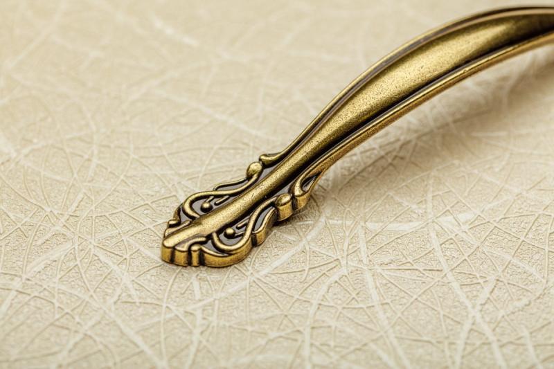 Zamaková kľučka WERONA C=128 mm antická mosadz 1208966253